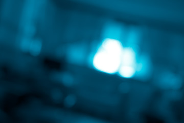 Blue bokeh. Blurred light on blue background.