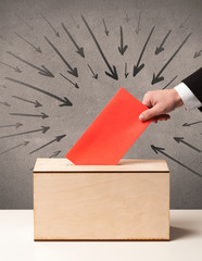 close up of a ballot box and casting vote