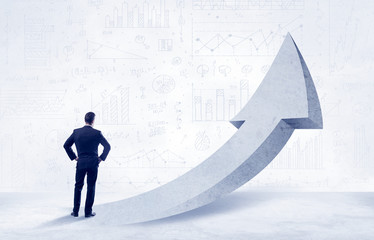Obraz premium Financial businessman with arrow concept