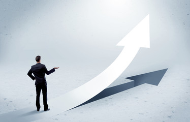 Arrow pointing up with standing salesman