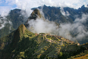 Inca citadel Machu Picchu with morning fog, Peru