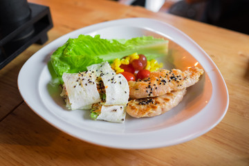 Grilled chicken breasts and vegetables, salad roll, Black Sesame Seeds