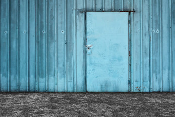 Obraz na płótnie Canvas Old blue metal door background.