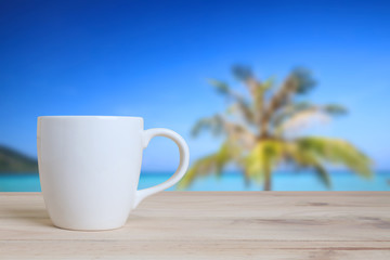 Cup of coffee on a wooden table.