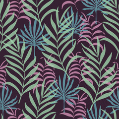 Fototapeta premium Tropical background with palm leaves. Seamless floral pattern