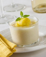 Fruit dessert with pineapple ice cream