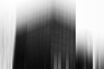 Vertical black and whites skyscraper blur background