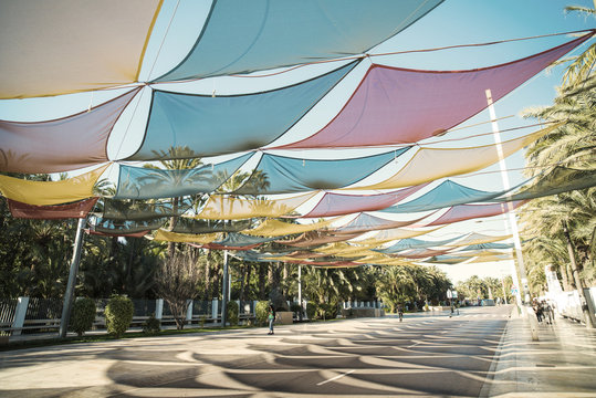Street under a canopy in the city of Elche. Region Alicante. Spain. Fine Art stile