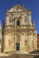 Obraz premium Martina Franca town, Apulia. The facade of St. Martin's Basilica at the Piazza Plebiscito, Taranto province, Apulia in South Italy.Eminent symbol of the Rococo Martina,