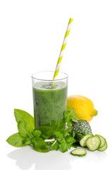 Green smoothie with cucumber,  mint, parsley and lemon as health