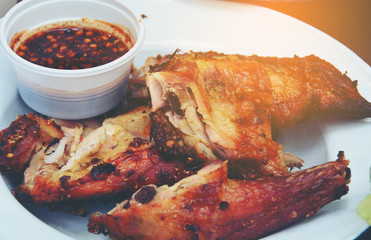 Grilled chicken on dish