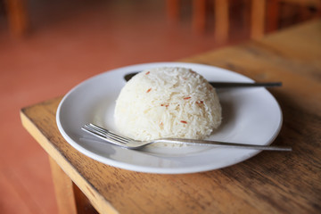 Thai rice on wooden table