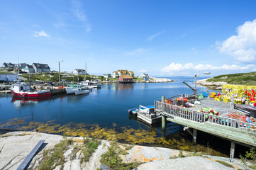 Scenic landscape view of the calm waters of the harbour in the fishing village of Peggy's Cove, in Halifax, Nova Scotia, Canada - obrazy, fototapety, plakaty