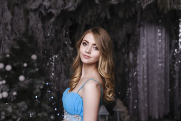 Fototapeta premium Beautiful girl in winter forest
