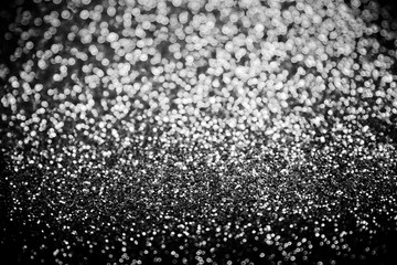 Silver dark diamond shiny glitter abstract bokeh for christmas or merry background