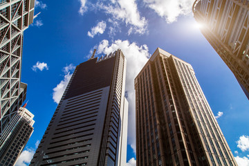 Fototapeta premium Low Angle View Of Modern Buildings with skyline.