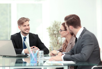 Business team discussing together business plans