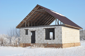 Building House Construction in Winter. New House Construction in winter.