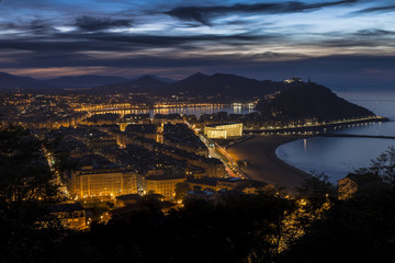 Fototapeta premium Night view of the spanish city of Donostia San Sebastian, Basque country, Spain