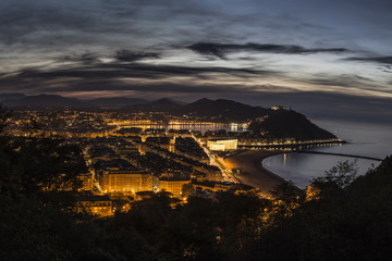 Fototapeta premium Night view of the spanish city of Donostia San Sebastian, Basque country, Spain