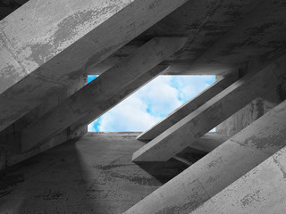 Concrete abstract architecture on cloudy sky background