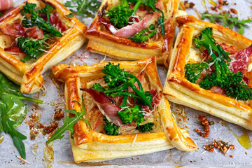 Bacon, cheese, tenderstem broccoli tips puff pastry, with green salad.