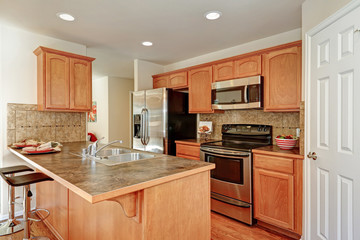 Kitchen room in brown and white colors