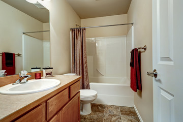 Bathroom interior in beige and brown colors.