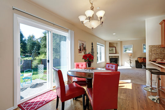 Dining area with nice red leather chairs