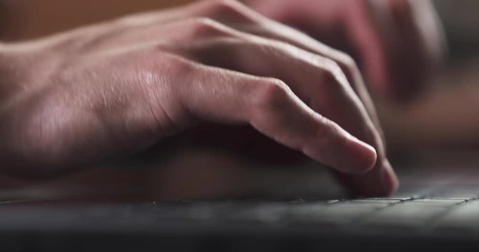 young man hand using notebook in cafe or home