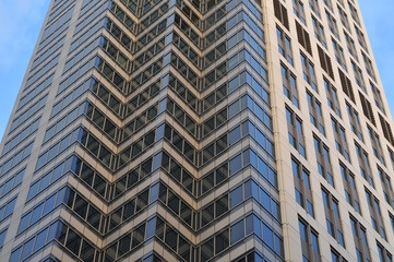 Glass pattern on skyscraper exterior wall.