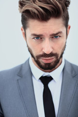 Portrait ofyoung business man, isolated on white background
