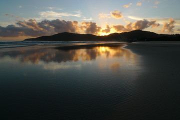 Fototapeta na wymiar Beautiful sunrise with reflections on the water