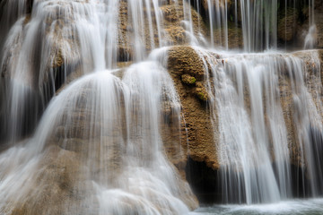 Close up flowing water at Huai Mae Khamin waterfall in deep forest, Thailand