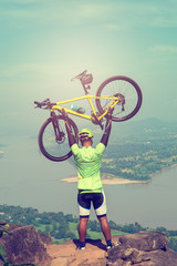 Success, success, success and winning concept with cycling, mountain biking happy. He spun on.