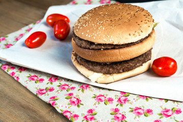 delicious American cheese burger with tomato
