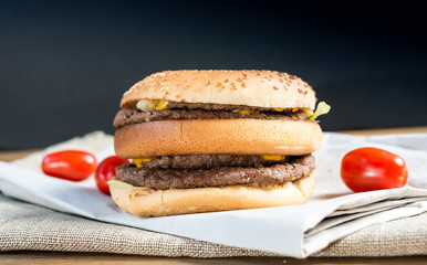 delicious American cheese burger with tomato