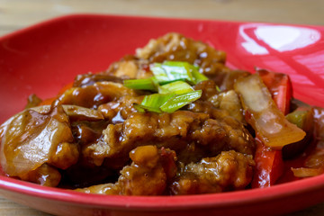 wok fried chicken stir fry with sweet peppers and chinese vegeta