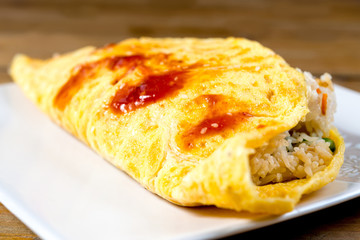 Japanese cuisine - omelet rice warpped on a plate