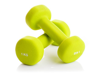 Two dumbbells on a white background