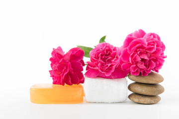 Fototapeta na wymiar Spa concept with tamarine soap,towel,zen stone and beautiful ros