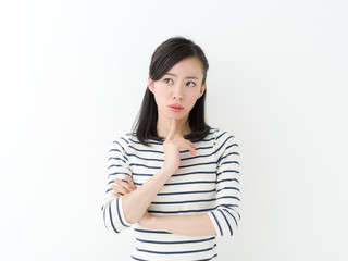 Obraz premium 悩む若い女性