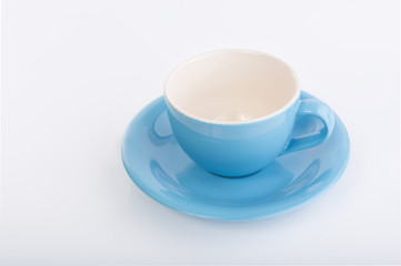 Blue coffee cup on white background