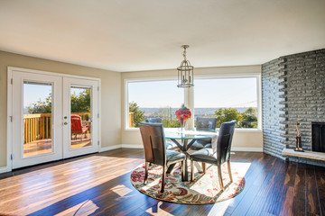Bright sunny dining room with hardwood floor