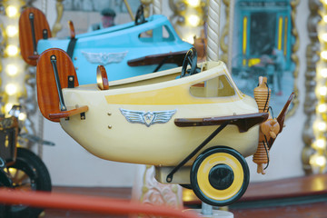 old children's carousel plane