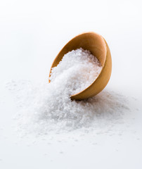 Sea Salt in a wooden bowl on white background