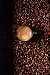 espresso coffee on coffee beans background