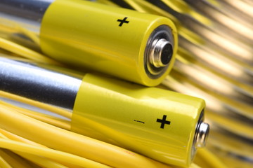 Alkaline battery with electrical cables close up
