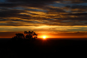 Fototapeta na wymiar The sun sets over the Utah desert somewhere between Moab and Canyonlands National Park.