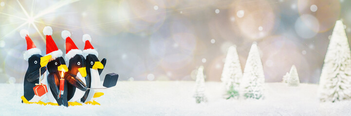 4 Penguins with Santa Hats Making a Selfie